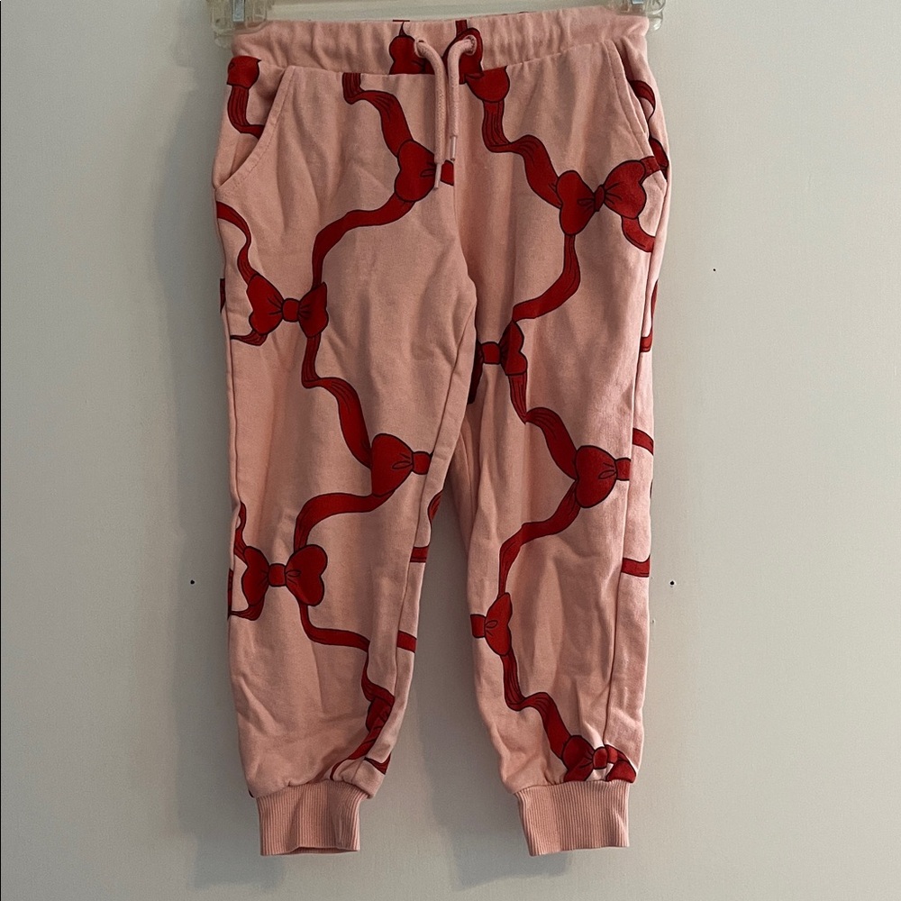 Mini Rodini Pink Joggers with Red Bow Pattern